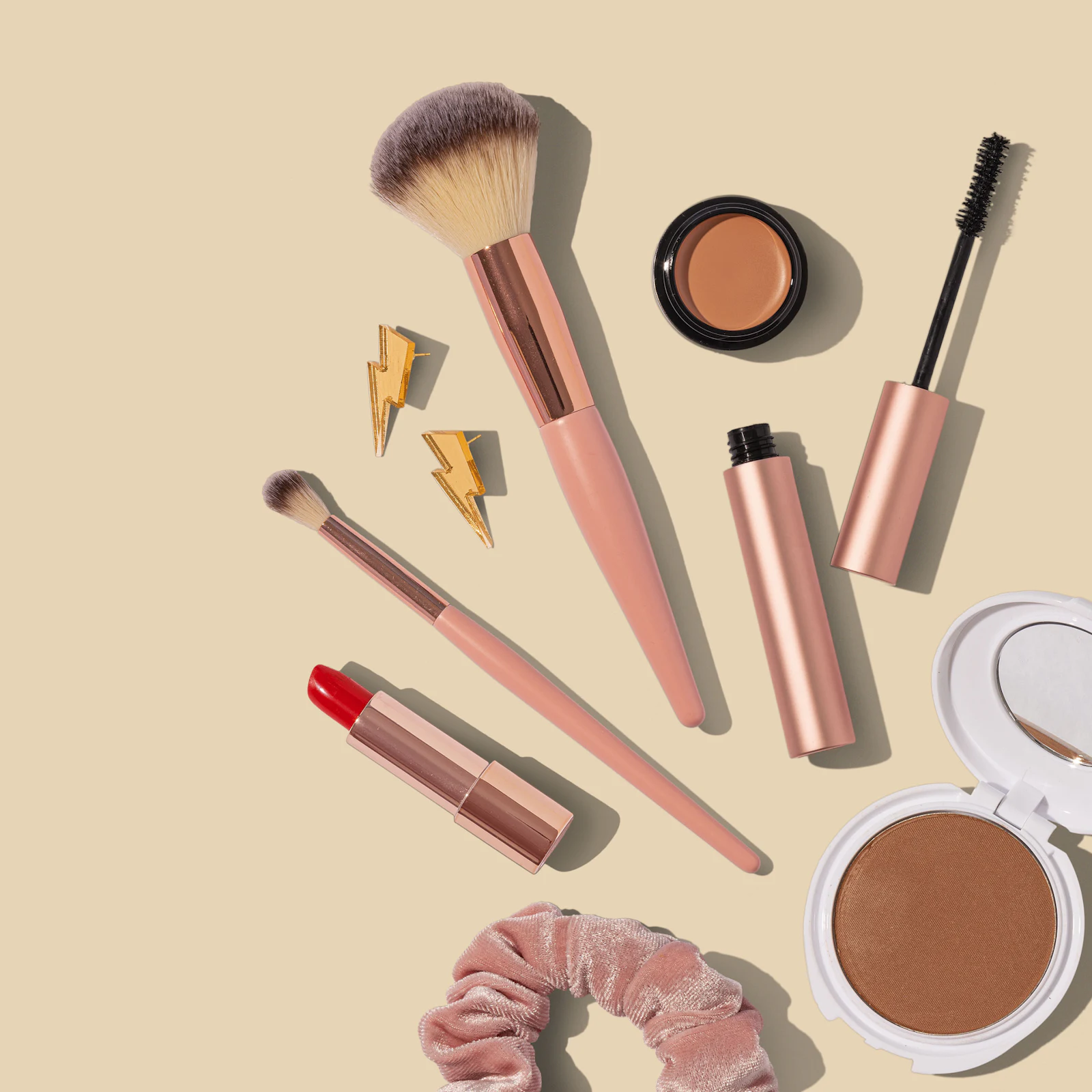 Professional makeup brushes arranged on a work surface