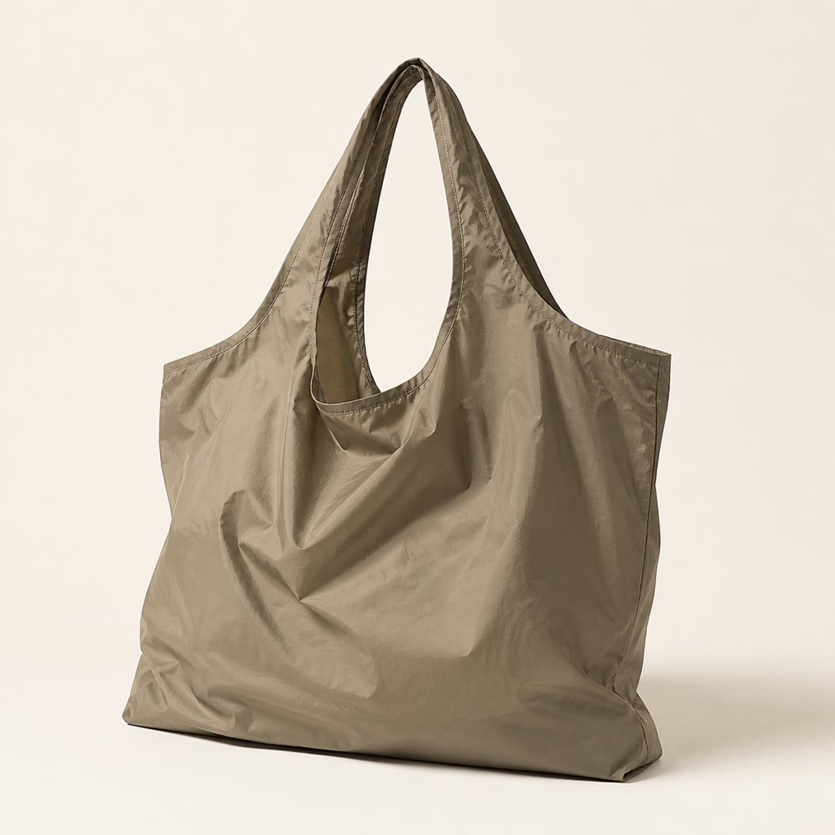 Editorial reference still-life — foldable nylon tote study